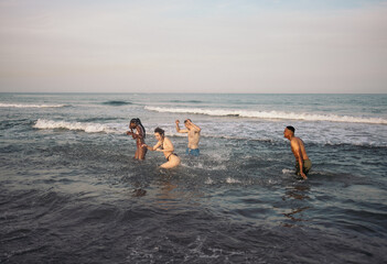 Friends having fun in the sea