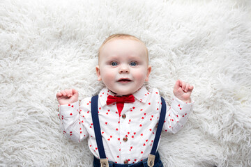Curious baby in bow tie