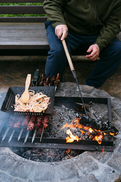 Faceless person cooking barbecue. 