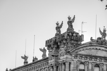 winged lions statues on building barcelona