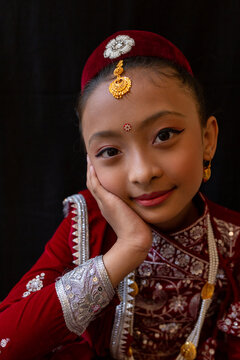 Happy Nepali girl in traditional attire 