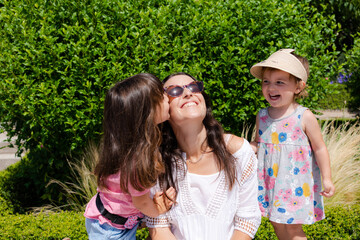 Happy mother with daughters