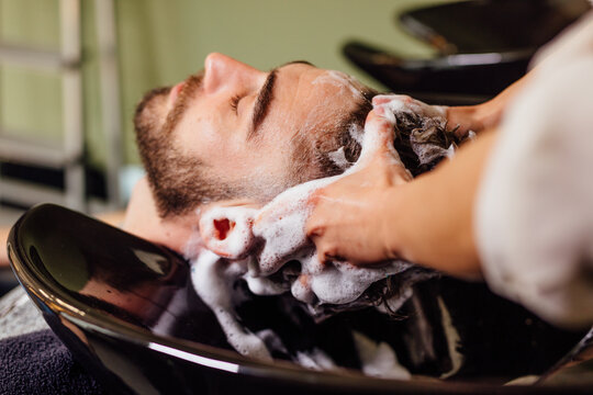 Hairwashing in hair saloon
