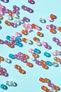 Assorted Colored Beads On Light Blue Background