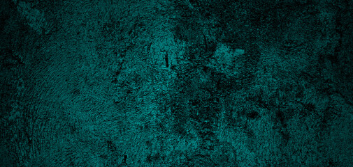 Fototapeta na wymiar Artistic wallpaper image of dark green and blue background stucco surface.