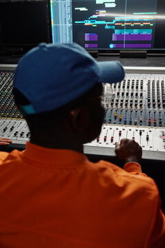 African American Man Working In Recording Studio