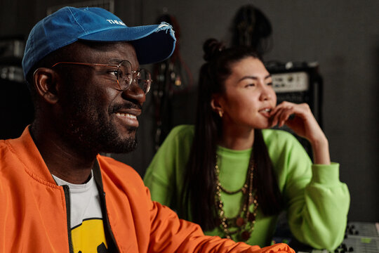 Man And Woman Working On Music Track
