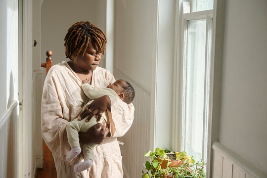 Concerned mother with baby