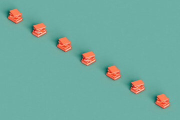 a row of a stack of pink books