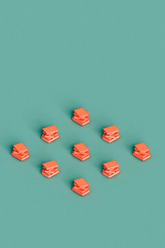 rhombus of stacks of pink books. 3d render