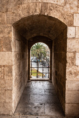 Obraz premium old stone arch texture and wall of old european fortress