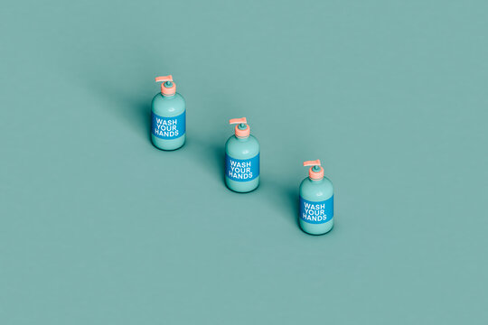 three blue soap bottles