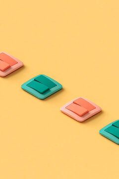 a row of colorful light switches