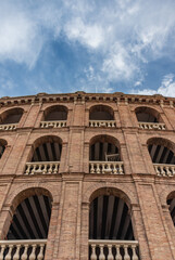 Fototapeta premium old european building with archs and brick