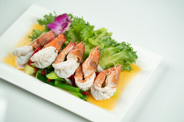 Thai spicy salad with shrimp white background
