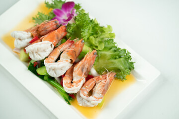 Thai spicy salad with shrimp white background
