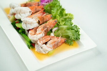 Thai spicy salad with shrimp white background
