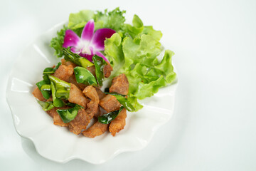 Thai food, fried pork with fish sauce
