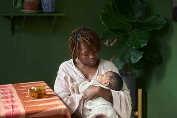 mother caring for baby