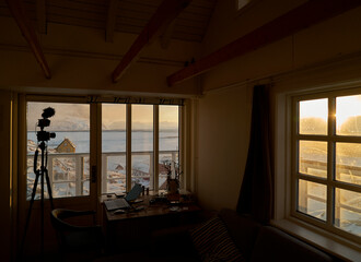 Greenland winter - camera indoors in house, amazing scenic view, sun