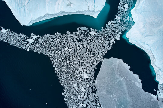 Greenland sea, spring - ice breaking up: climate change thawing Arctic