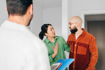 Realtor Showing Apartment to Clients 