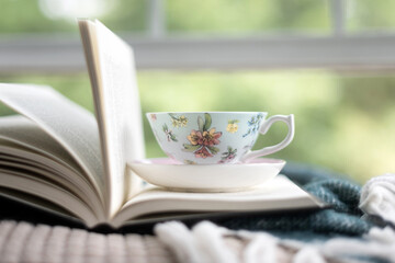 Open book with tea