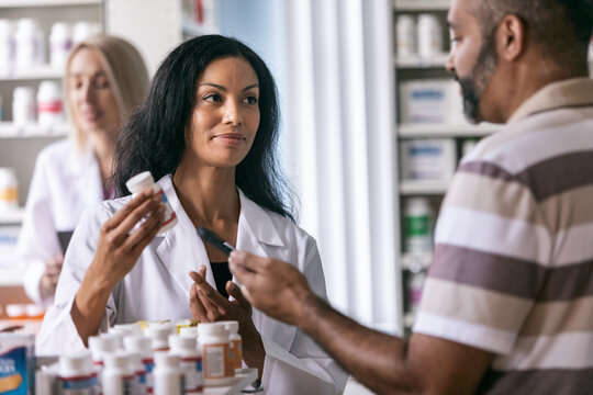 RX: Customer Gets Advice From Pharmacist