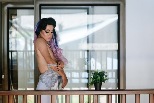 Drag queen man undressing