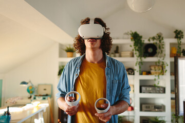 Man with long hair using VR headset for streaming