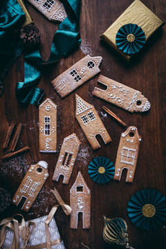 Gingerbread houses cookies with icing on a christmas table