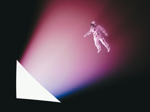 Astronaut approaching a triangle of light