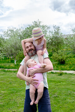  father's day: dad and daughters
