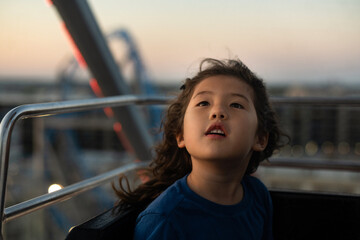 Little girl on ferris wheel