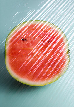 Watermelon behind a transparent plastic layer