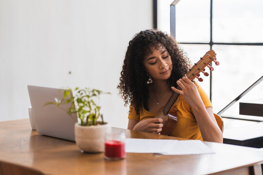 Woman Learning Music At Home