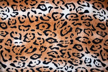 Tiger blanket background. Matter bedspread tiger coloring texture. Tiger color soft fabric.