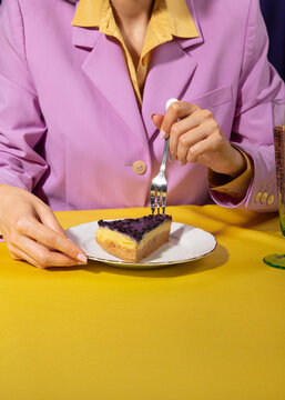 Woman eating a piece of cake