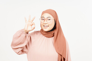 Showing OK Sign of Beautiful Asian Woman Wearing Hijab Isolated On White Background