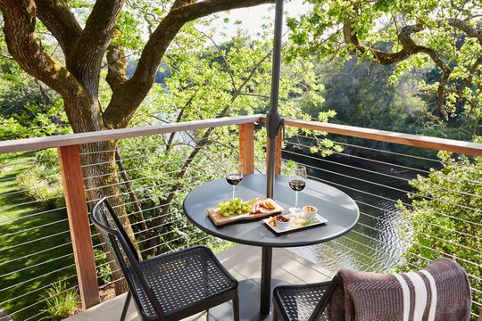 Balcony with view with wine and cheese at luxury boutique hotel
