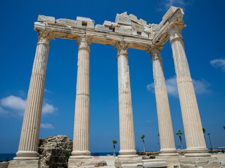 Fototapeta premium Ruins of the Temple of Apollo in old town of Side at beautiful summer day, Antalya, Turkey. Close up