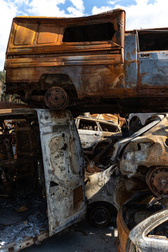 Cemetery of burnt rusty cars.