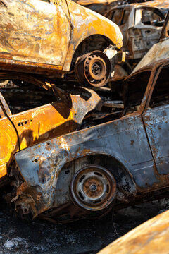 Cemetery of burnt rusty cars.