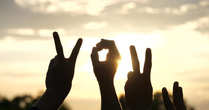 Happy New year 2023 concept,hand with sunrise or sunset and new year symbol 2023