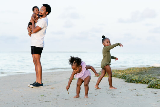 Candid family on the beach