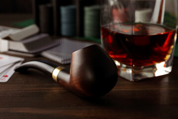 Concept of relaxation with smoking tobacco, drinking alcohol and play poker