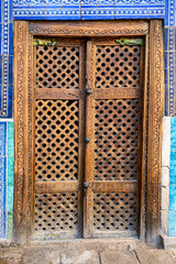 Carved handmade doors in the old city of Khiva.