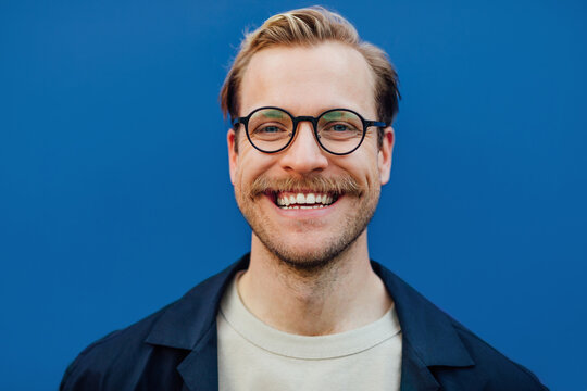 Man with Glasses Smiling