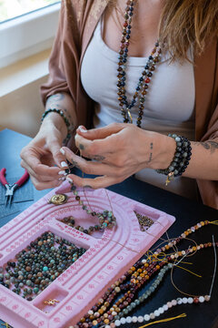 Woman making jelwery