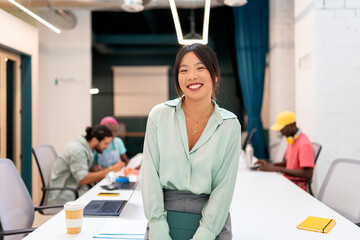 Asian entrepreneur woman in a modern office